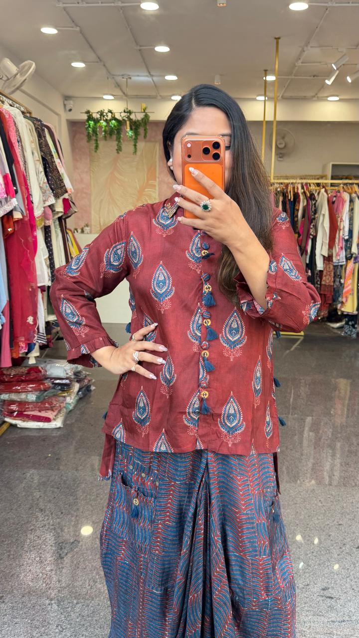 Designer cowl skirt paired with Mul silk red shirt in red
