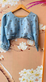 Pretty soft silk saree in blue with handwork comes with stitch blouse