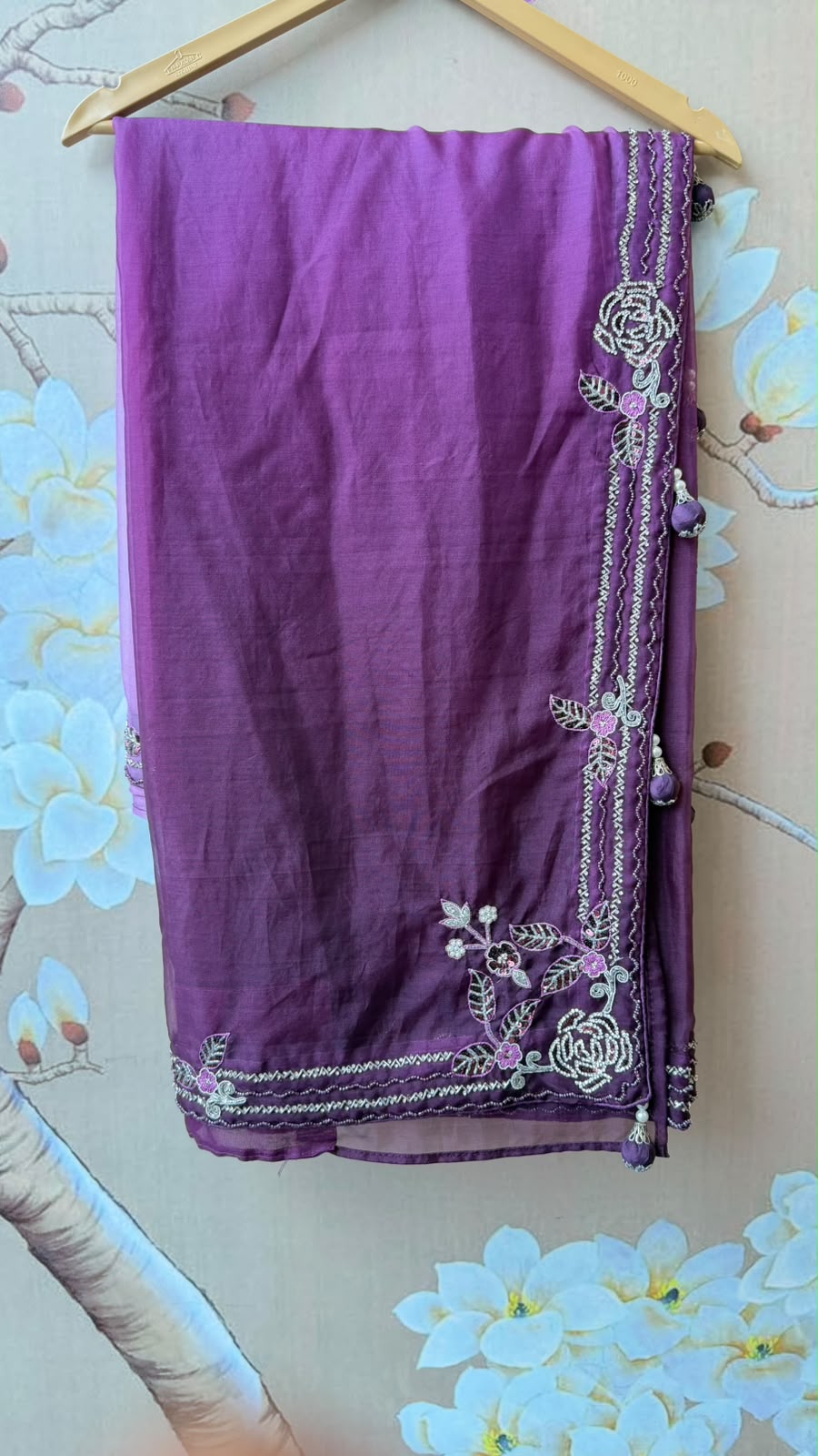 Pretty handwork on blouse and saree in wine