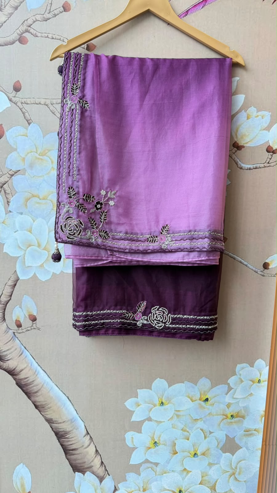 Pretty handwork on blouse and saree in wine