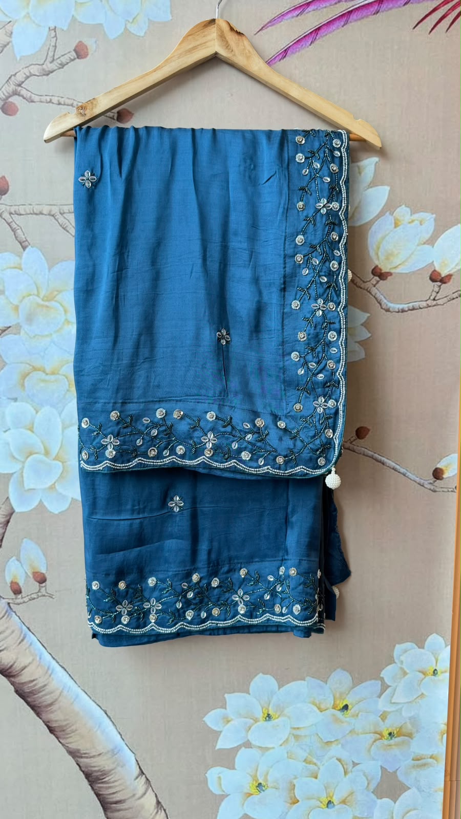 Pretty soft silk saree in blue with handwork comes with stitch blouse