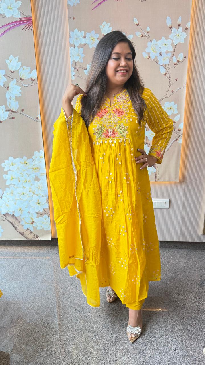 Prettiest yellow Premium Mul chanderi with pearl detailing suit set