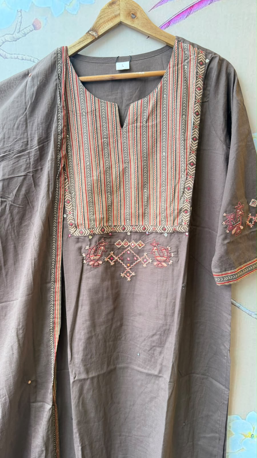Pretty cotton ajrakh highlighted with katha suit set
