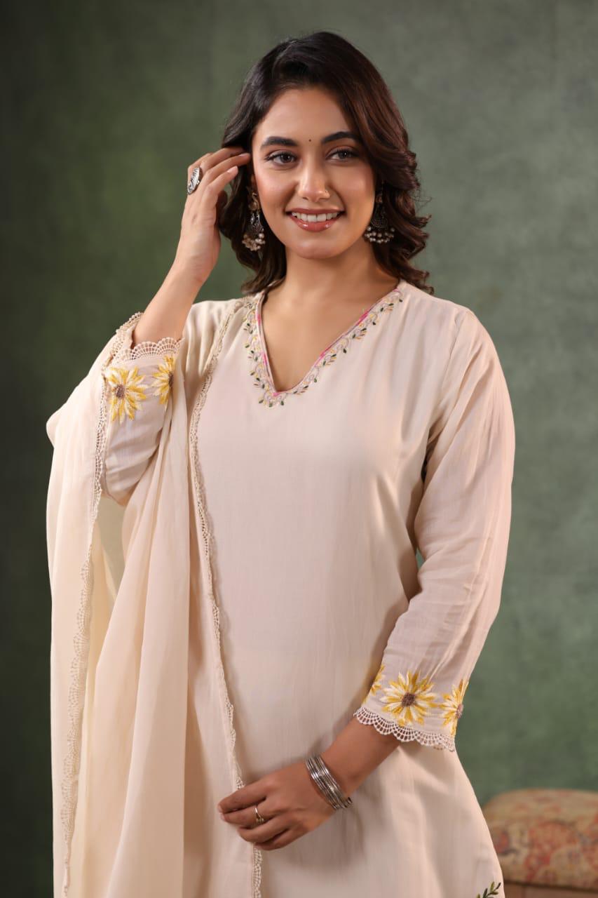 Pretty embroidered Mul chanderi beige suit set