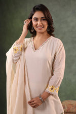 Pretty embroidered Mul chanderi beige suit set