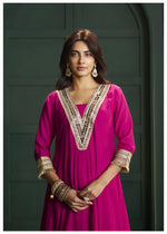 Rani pink lace detailing suit set paired with Banarasi dupatta