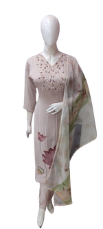 Pure muslin silk with beautiful hand embroidery paired with organza dupatta