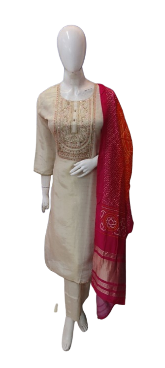 Pretty shimmer tissue suit in ivory colour paired with bandhani dupatta