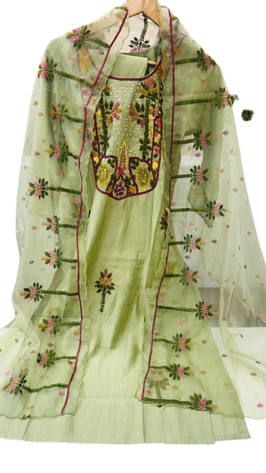 Muslin embroidered suit paired with orgenza dupatta