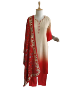 Smart Dola silk ombré effect suit paired up with a gorgeous kalamkari dupatta in beige n red