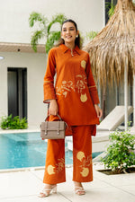 Smart appliqué work cotton co rd in rust