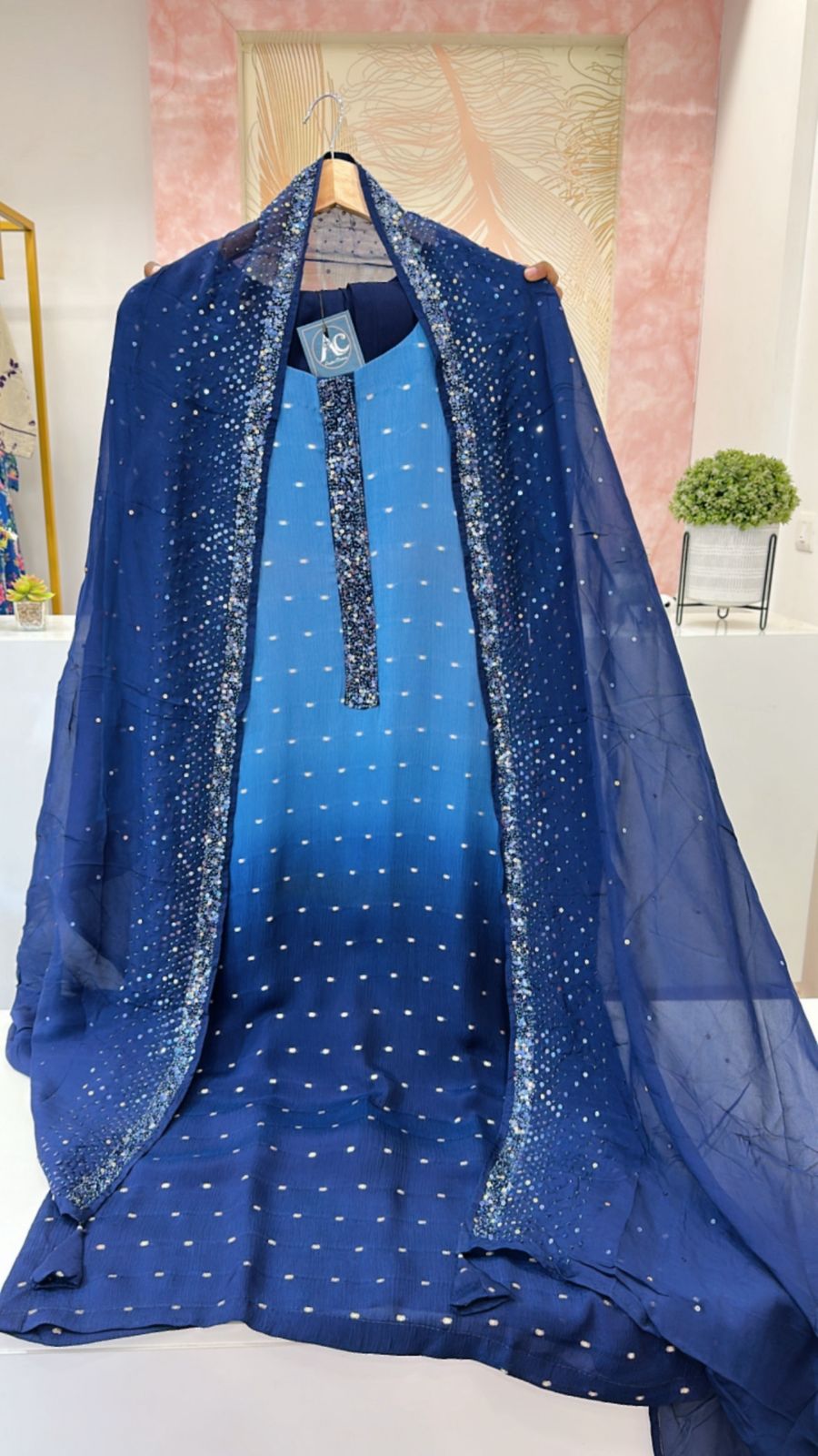 Heavy chinon with full gold Zari weaving suit paired with crepe embellished dupatta in blue