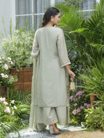 Cut work shimmer tissue full suit in green