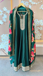 Dola silk Anarkali suit paired with floral dupatta in green