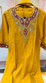 Dola silk hand work suit set paired with Banarasi dupatta in yellow