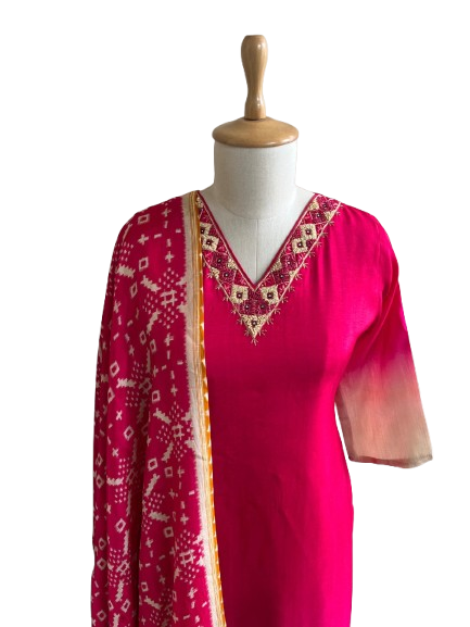 Pretty ombré silk suit paired with Patola dupatta