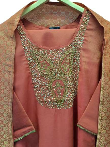 Pretty tissue with Banarasi dupatta and heavy handwork in peach