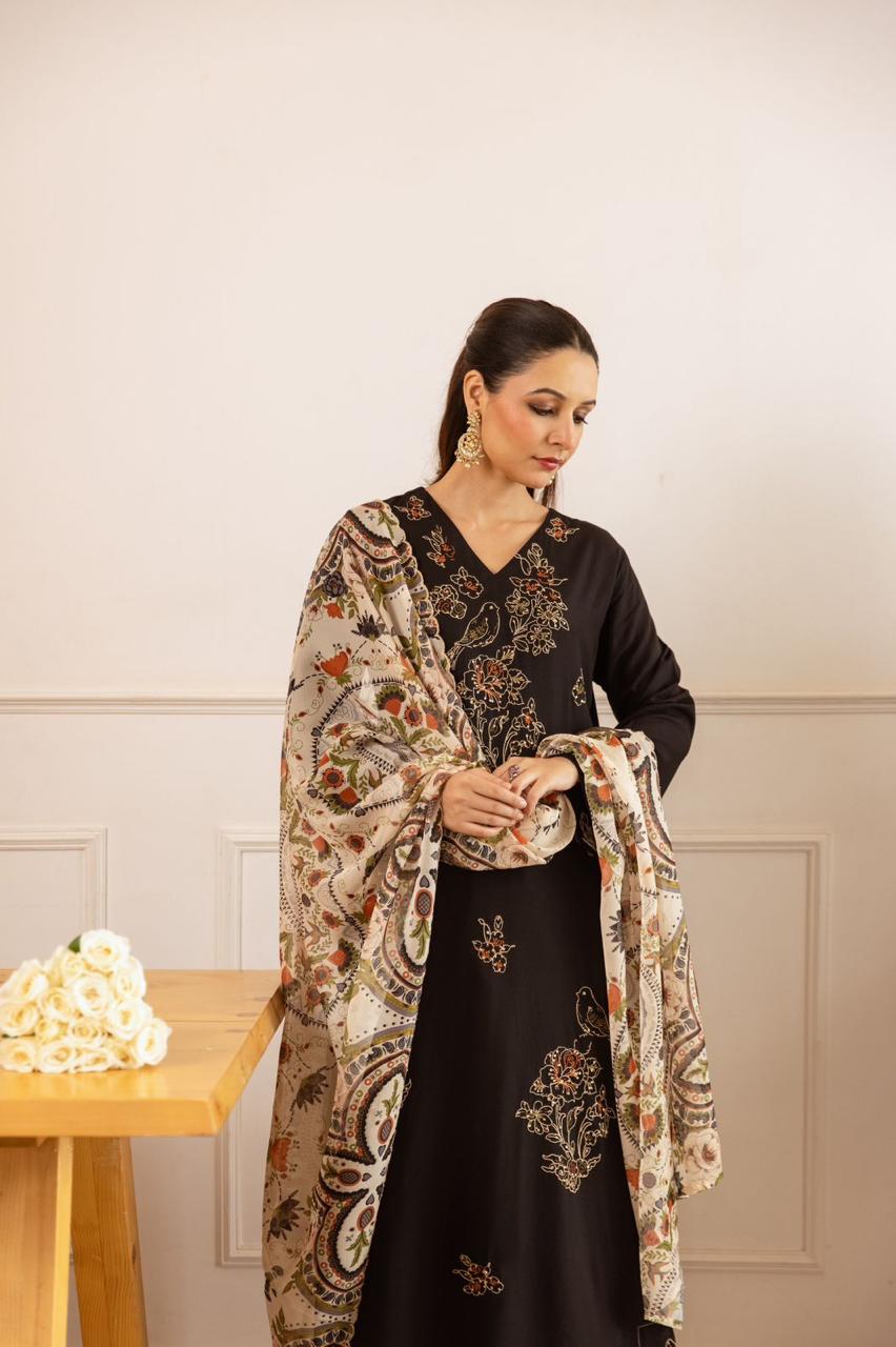 Heavy rayon embroidered suit set paired with soft orgenza dupatta in black