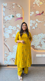 Pretty cotton Ikkat printed V neck plazzo pant suit set in yellow