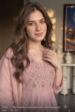 Pretty mulchanderi with bead work and lining full suit in pink
