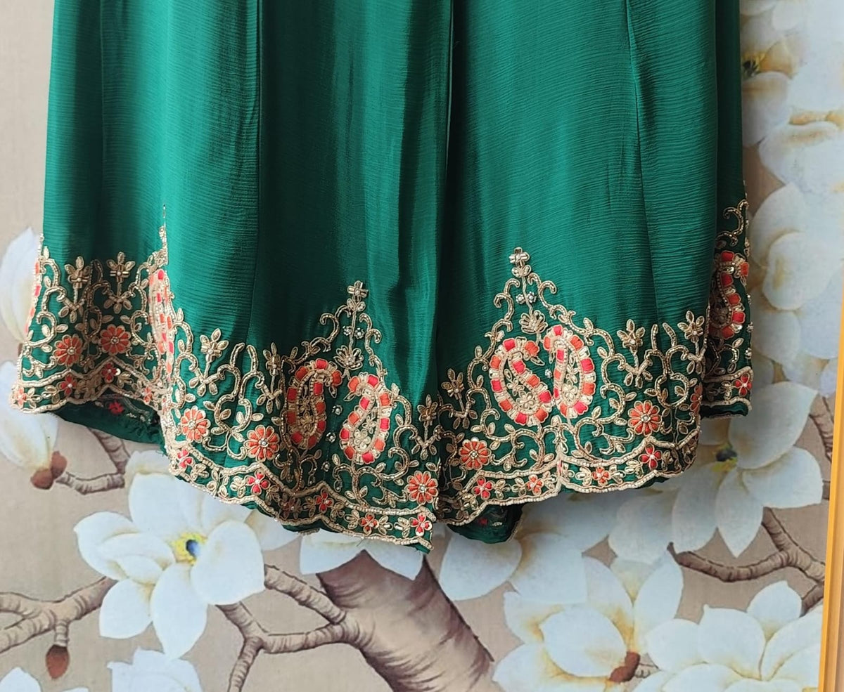 Emerald green heavy plazzo pant suit set with intricate detailing