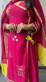 Premium Mul chanderi with pretty applique and gotta detailing in Rani pink