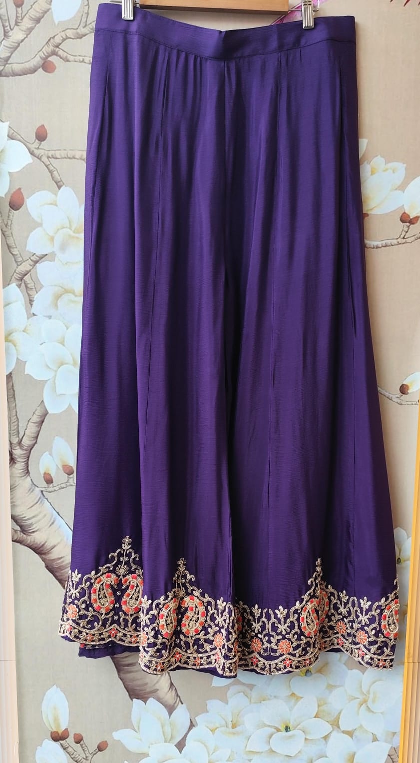 Beautiful purple heavy plazzo pant suit set with intricate detailing