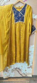 Premium crepe silk zari detailing and brocade highlight suit set in yellow