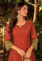 Festive co ord with real mirror and ajrakh detailing farshi salwar in rust