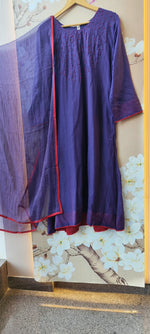 Pure Banarasi Mul chanderi with githan work and red border highlight all over paired with Kota doriya dupatta