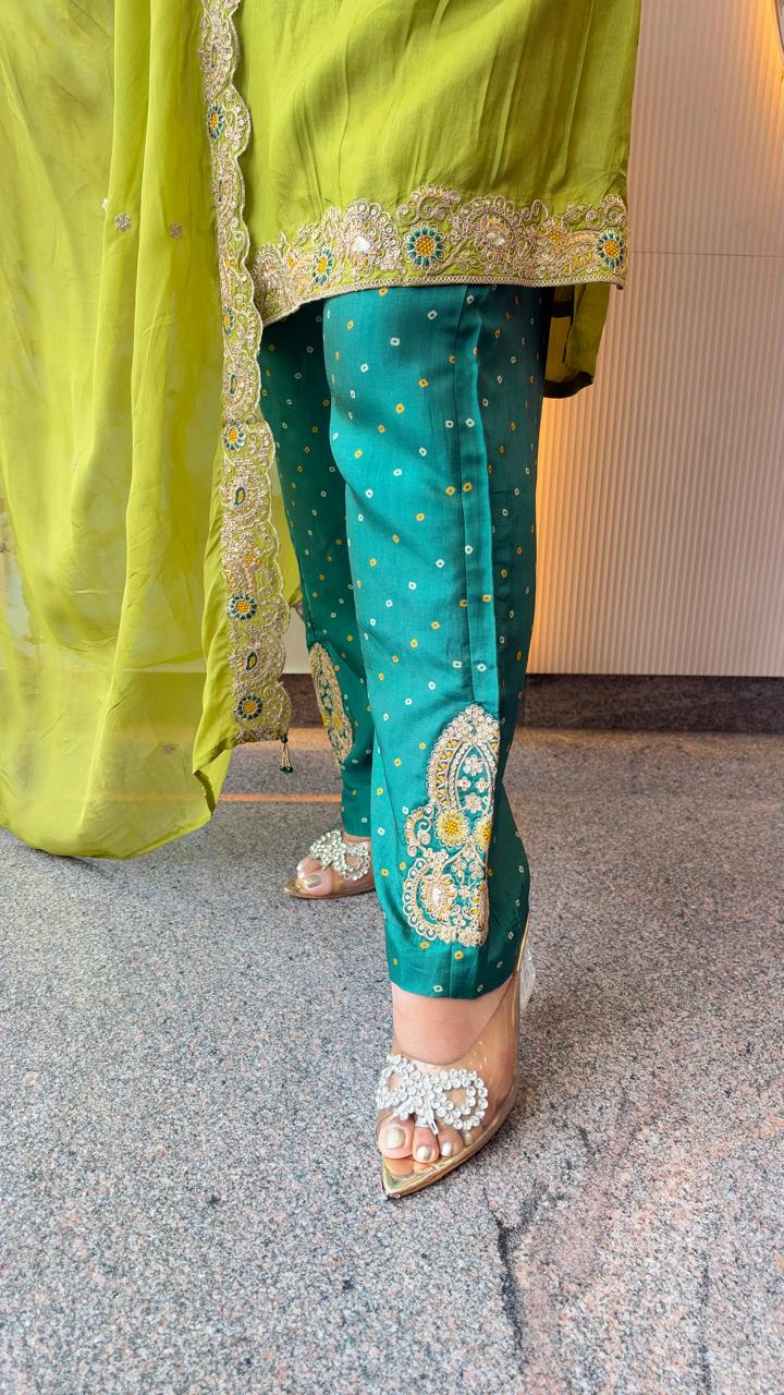 Designer suit set in soft silk fabric true to size in green paired with organza dupatta n zari detailing