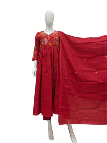 Pretty Mul cotton with intricate embroidered detailing paired with a brush painted dupatta in red