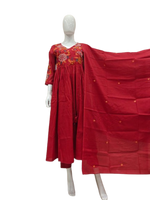 Pretty Mul cotton with intricate embroidered detailing paired with a brush painted dupatta in red