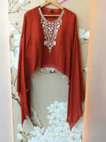 Pretty chinon hand word kaftan paired with brocade plazzo pants in orange