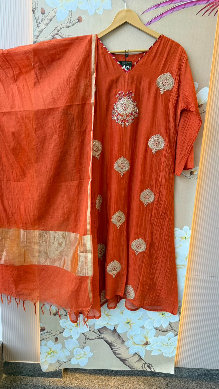 Premium zari detailing Mul chanderi suit set in orange