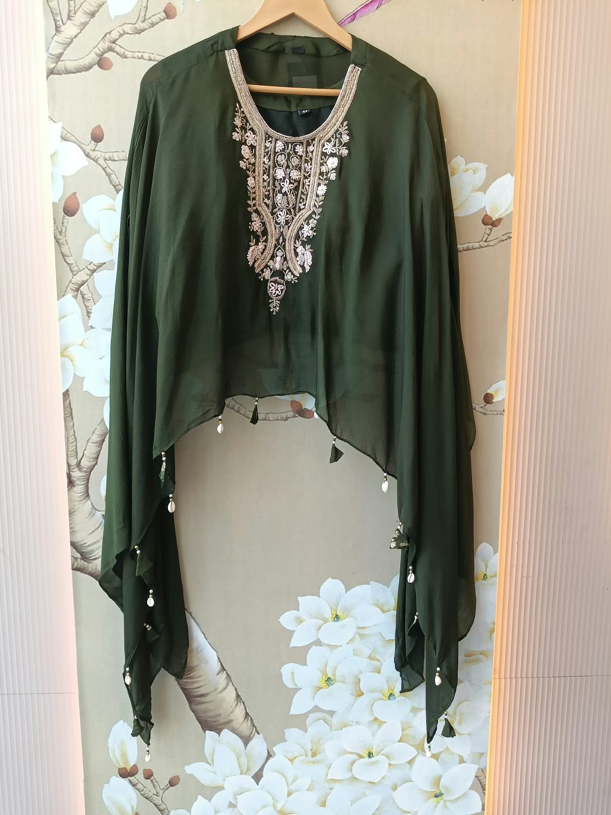 Pretty chinon hand word kaftan paired with brocade plazzo pants in green