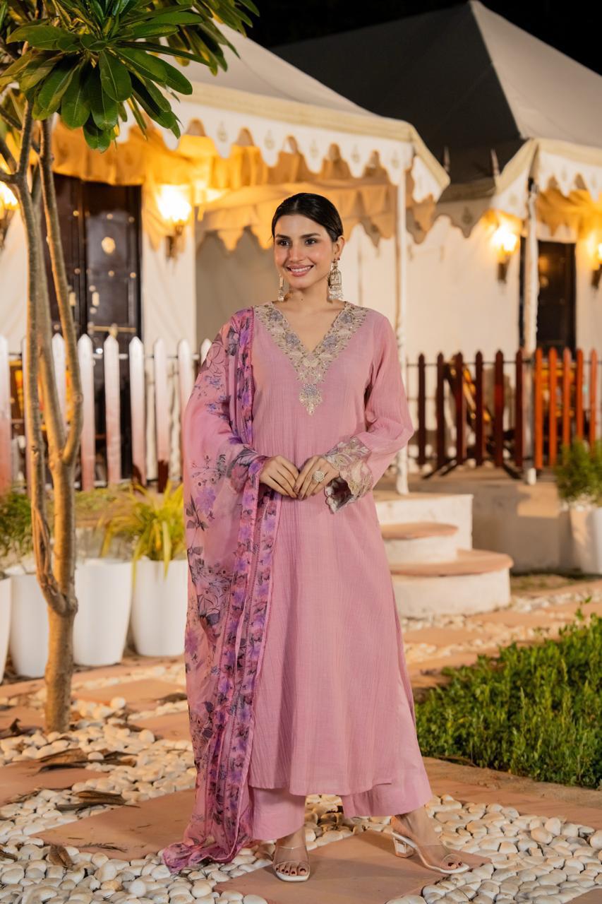 Stylish crush cotton designer suit set in yellow paired with a Kalamkari dupatta in pink