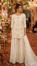 Heavily embroidered premium chinon palzzo set in ivory