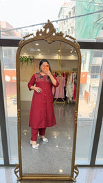 Premium cotton applique work cotton suit in red with pocket and paired with a Kalamkari