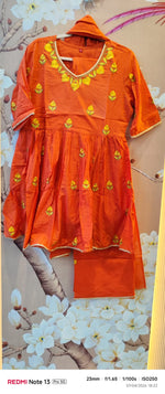 Cotton peplum embroidered in orange