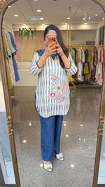 Soft linen applique work kurta paired with soft denim pant