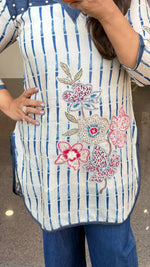 Soft linen applique work kurta paired with soft denim pant