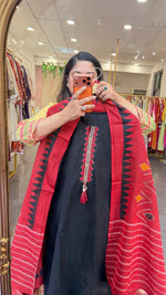 Black Cotton suit set paired with Ikkat dupatta in red