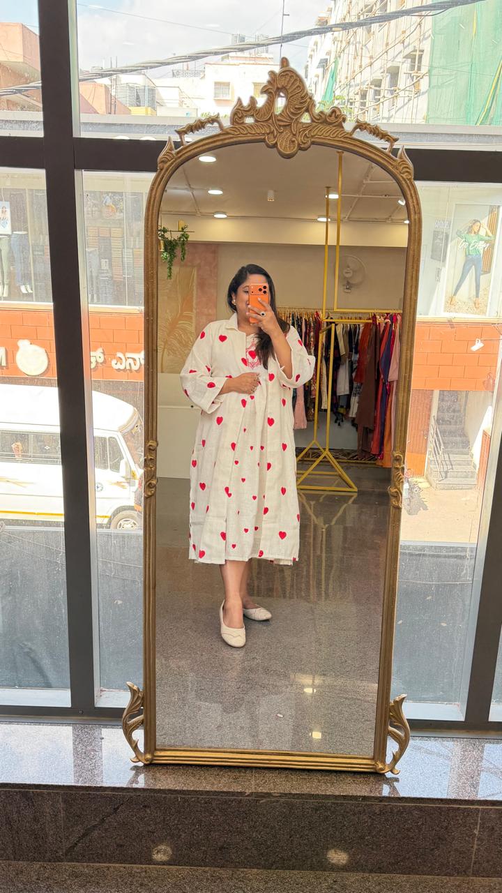 Organic cotton embroidered shrug dress. A smart piece