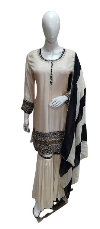 Premium silk kurta with mirror work paired with chinon sharara and organza dupatta