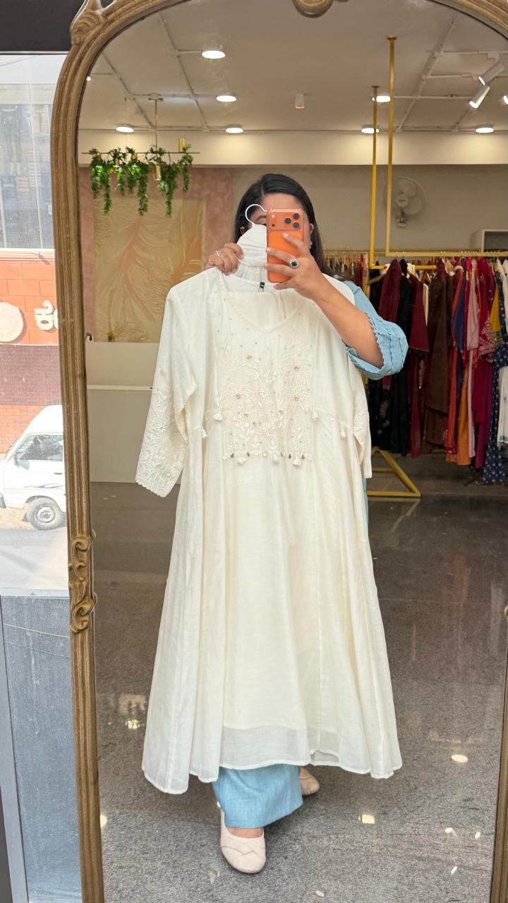 Elegance at its best! Premium Mul chanderi lining intricate hand embroidery suit set in ivory