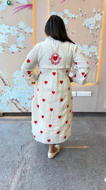 Organic cotton embroidered shrug dress. A smart piece
