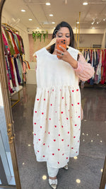 Organic cotton embroidered shrug dress. A smart piece