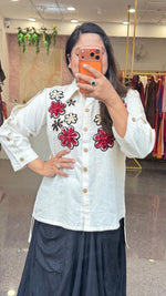 Super smart embroidered top paired with a super soft versatile soft gaji silk coule skirt