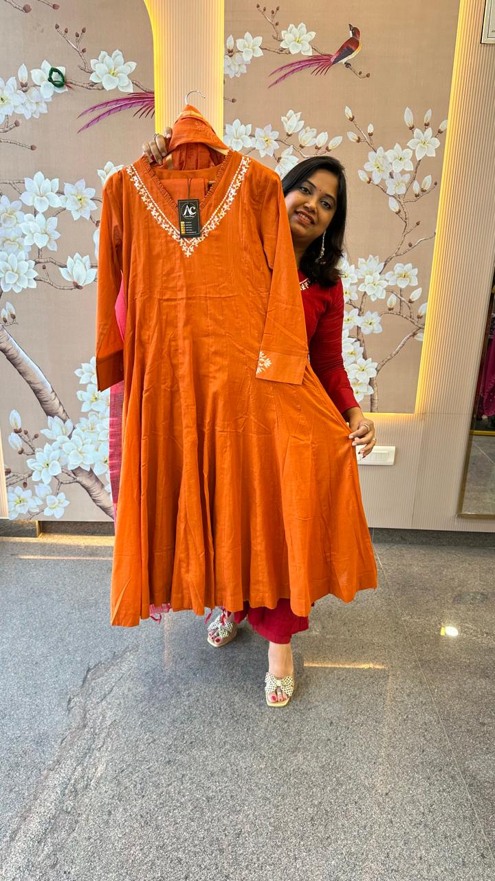 Pretty mul cotton lining suit set paired with Kota Doria dupatta in rust
